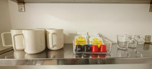 Η κουζίνα ή μικρή κουζίνα στο Studio centre historique 200 m de la mairie - Climatisé +17 φωτογραφίες