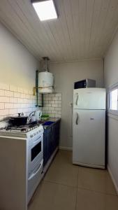 Η κουζίνα ή μικρή κουζίνα στο Cabaña en General Acha