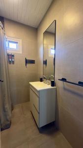 Ένα μπάνιο στο Cabaña en General Acha +8 φωτογραφίες