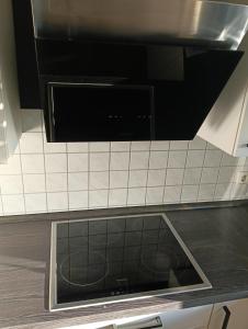 Η κουζίνα ή μικρή κουζίνα στο Wohnung in der Mosselstraße