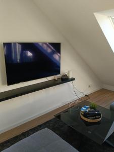 Μια τηλεόραση ή/και κέντρο ψυχαγωγίας στο Wohnung in der Mosselstraße
