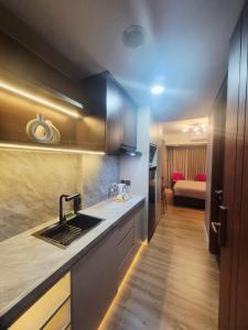 Kuchyň nebo kuchyňský kout v ubytování Apartement Seaview studio at pollux batam