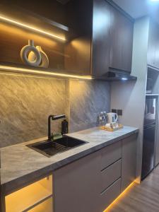 Kuchyň nebo kuchyňský kout v ubytování Apartement Seaview studio at pollux batam