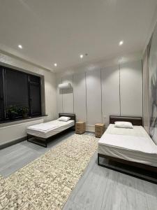 Ένα ή περισσότερα κρεβάτια σε δωμάτιο στο Viva Inn