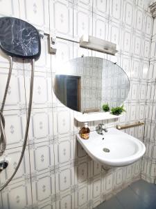 Ένα μπάνιο στο Bio Apartment Sea View Quiet and Cozy