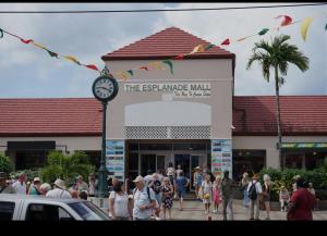 a crowd of people walking in front of a building at Oceanview suites Very comfortable in Saint Georgeʼs +7 photos