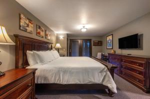 Ένα ή περισσότερα κρεβάτια σε δωμάτιο στο 18 Lodge