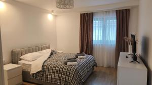 En eller flere senge i et værelse på Casa Manu