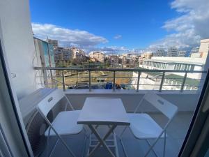 Μπαλκόνι ή βεράντα στο Cozy Apartment with Lake View