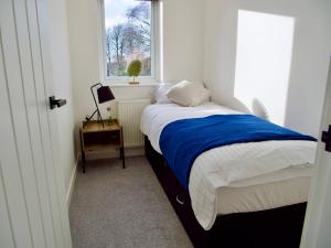 Voodi või voodid majutusasutuse Ideal Lodgings in Radcliffe toas