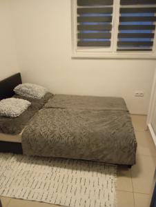 Postel nebo postele na pokoji v ubytování Apartmán Domažlice