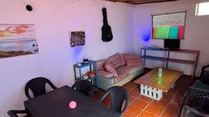 Un televizor și/sau centru de divertisment la 7 Calcosas