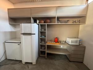 Køkken eller tekøkken på Vivi Beach Macapá