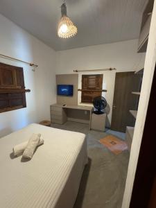 Et tv og/eller underholdning på Vivi Beach Macapá