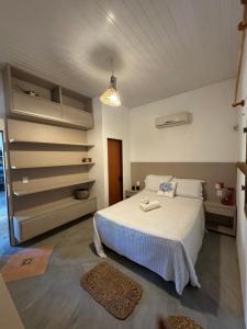 En eller flere senge i et værelse på Vivi Beach Macapá + 21 billeder