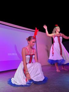 two women in dresses sitting on the ground at Camping Parc Bellevue in Cannes +35 photos