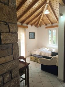 Postel nebo postele na pokoji v ubytování Eva's Apartments