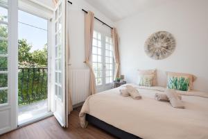 Ένα ή περισσότερα κρεβάτια σε δωμάτιο στο Maison design