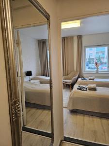 Ένα ή περισσότερα κρεβάτια σε δωμάτιο στο Humppilantie