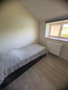 Postel nebo postele na pokoji v ubytování Gîte 4 personnes tout équipé à Anzy-le-Duc