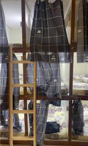 Palanda nebo palandy na pokoji v ubytování Holiday Homes