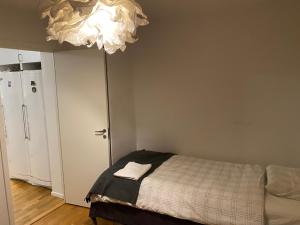 Un pat sau paturi într-o cameră la Westfield Private Room