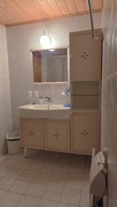 a bathroom with a sink and a mirror at Chalet Ecureuil à Champoussin - Portes du Soleil in Champoussin +27 photos