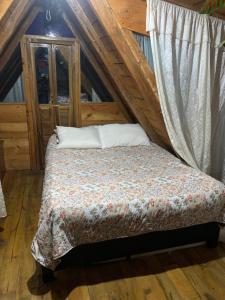 Voodi või voodid majutusasutuse Cabaña Cumanday toas