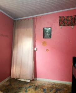 TV a/nebo společenská místnost v ubytování Casa da Pri - Quarto Quádruplo - Vila São Jorge