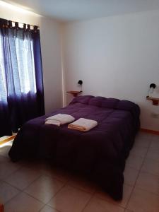 En eller flere senge i et værelse på Complejo Del Bosque + 4 billeder