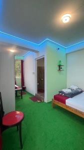 Ένα ή περισσότερα κρεβάτια σε δωμάτιο στο Yolmo Sojourn Resort