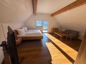 Ένα ή περισσότερα κρεβάτια σε δωμάτιο στο Zum Kaiserwirt