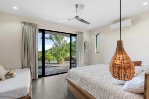 Ένα ή περισσότερα κρεβάτια σε δωμάτιο στο Villas Vivo