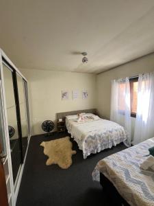 Postel nebo postele na pokoji v ubytování Apzinho do Centro