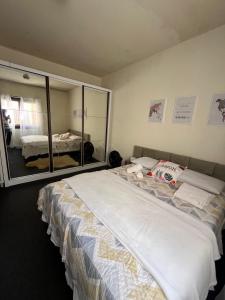 Postel nebo postele na pokoji v ubytování Apzinho do Centro