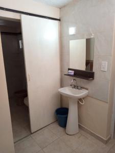 Et badeværelse på Depto Santo Brochero centro