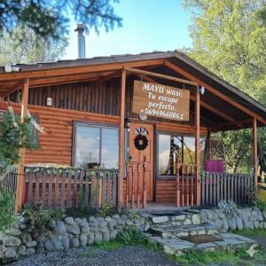 una baita con un cartello che recita Maxwell Worst Tim Acoustic Barbecue di Centro Turístico Mayu Wasi a Los Angeles Altre 27 foto