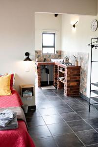 a bathroom with a sink and a counter in a room at Pecan and Lime Inn The Third Den in Pretoria