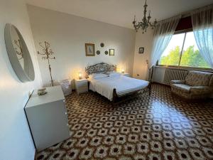 Postel nebo postele na pokoji v ubytování Private accommodation with large terrace in Salento