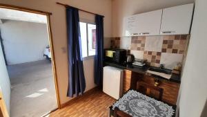 Køkken eller tekøkken på Cabaña DOÑA LILIA