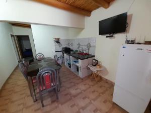 Et tv og/eller underholdning på Cabaña DOÑA LILIA