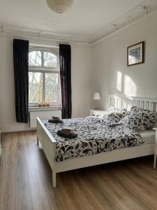 Postel nebo postele na pokoji v ubytování Schöne 3-Zimmer Wohnung im Herzen von Wuppertal