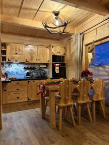 Kuchyň nebo kuchyňský kout v ubytování Domek z Sercem