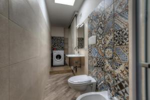 Koupelna v ubytování Cento Passi dal Mare + 65 fotografií