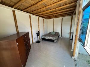 Postel nebo postele na pokoji v ubytování Casa girardot cundinamarca + 13 fotografií