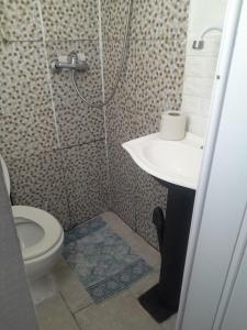 Vannituba majutusasutuses Atardecer