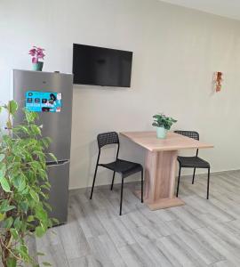 TV a/nebo společenská místnost v ubytování Modern Living Apartment Hotel