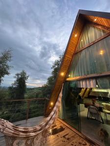 Balkón nebo terasa v ubytování Chalés Mirante da Serra PB + 35 fotografií