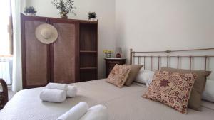 Postel nebo postele na pokoji v ubytování Al Numero 5