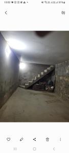 Francys Gomes في كايكو: صورتان لنفق به درج +صورة واحدة